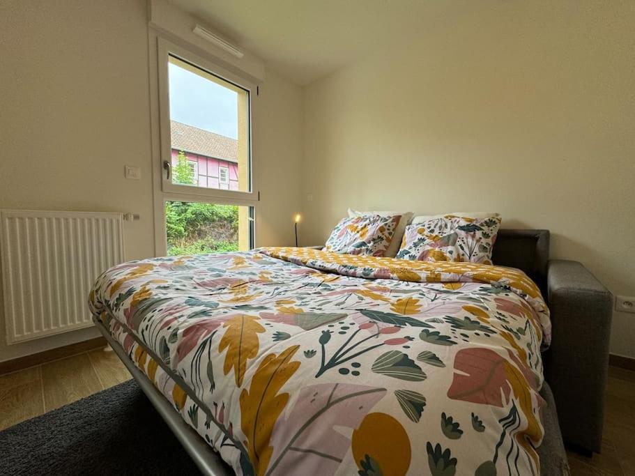 Postel nebo postele na pokoji v ubytování Au Domaine des Vignes - Appt 4 Pers avec balcon