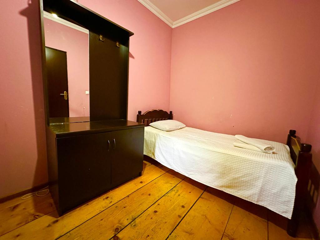 Postel nebo postele na pokoji v ubytování Mziuri Guest House