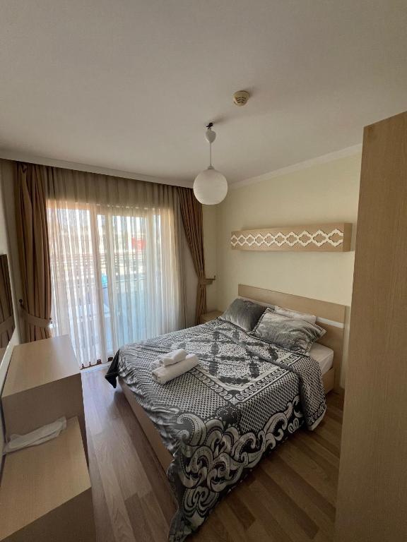 Postel nebo postele na pokoji v ubytování Agartha Suite Hotel Kemer