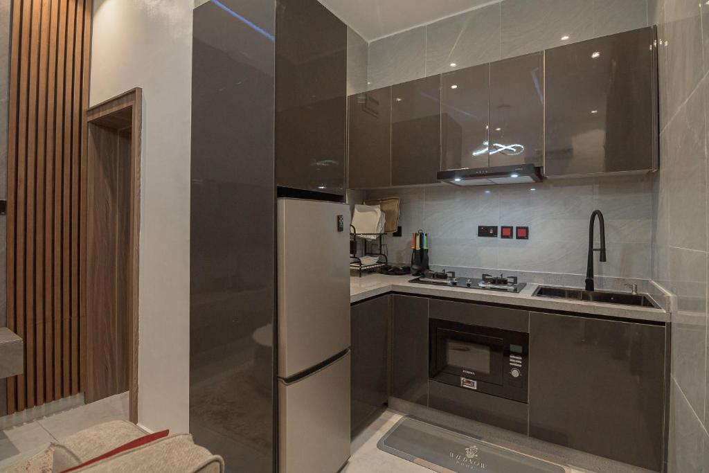 Kuchyň nebo kuchyňský kout v ubytování One90 Apartment