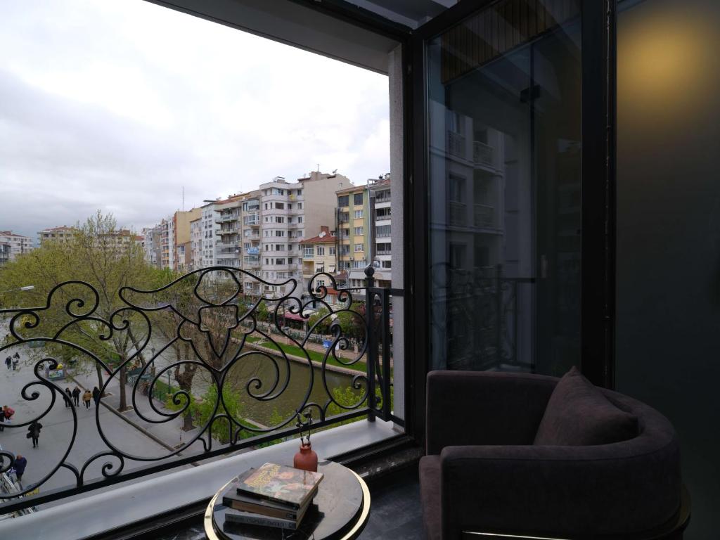 Balkón nebo terasa v ubytování SennaCity Hotel