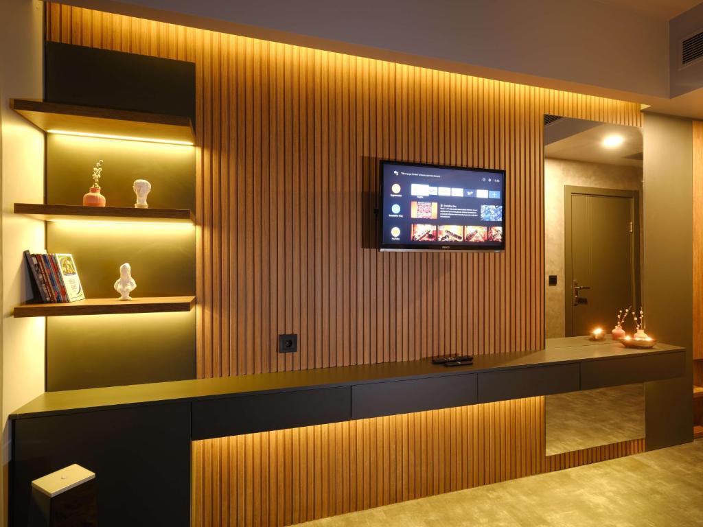 TV a/nebo společenská místnost v ubytování SennaCity Hotel