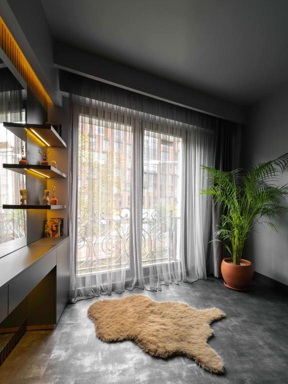Postel nebo postele na pokoji v ubytování SennaCity Hotel