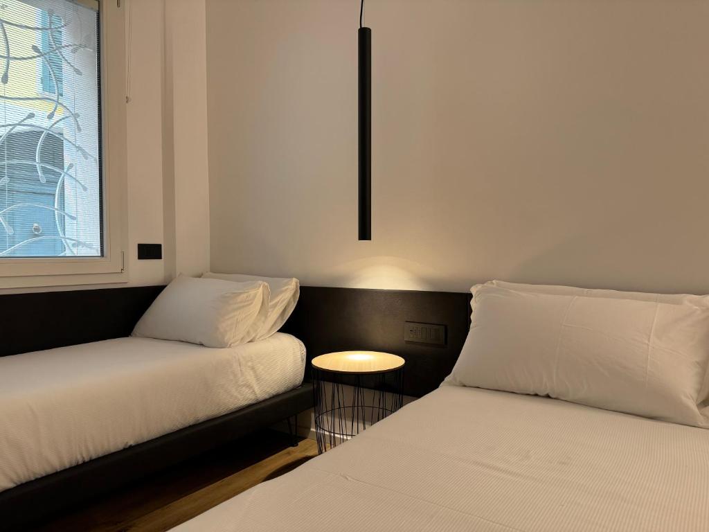 Postel nebo postele na pokoji v ubytování AdisArtur Elegant B&B