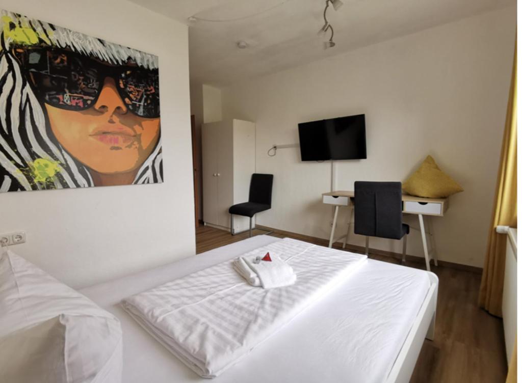 TV a/nebo společenská místnost v ubytování Hotel Wettlaufer