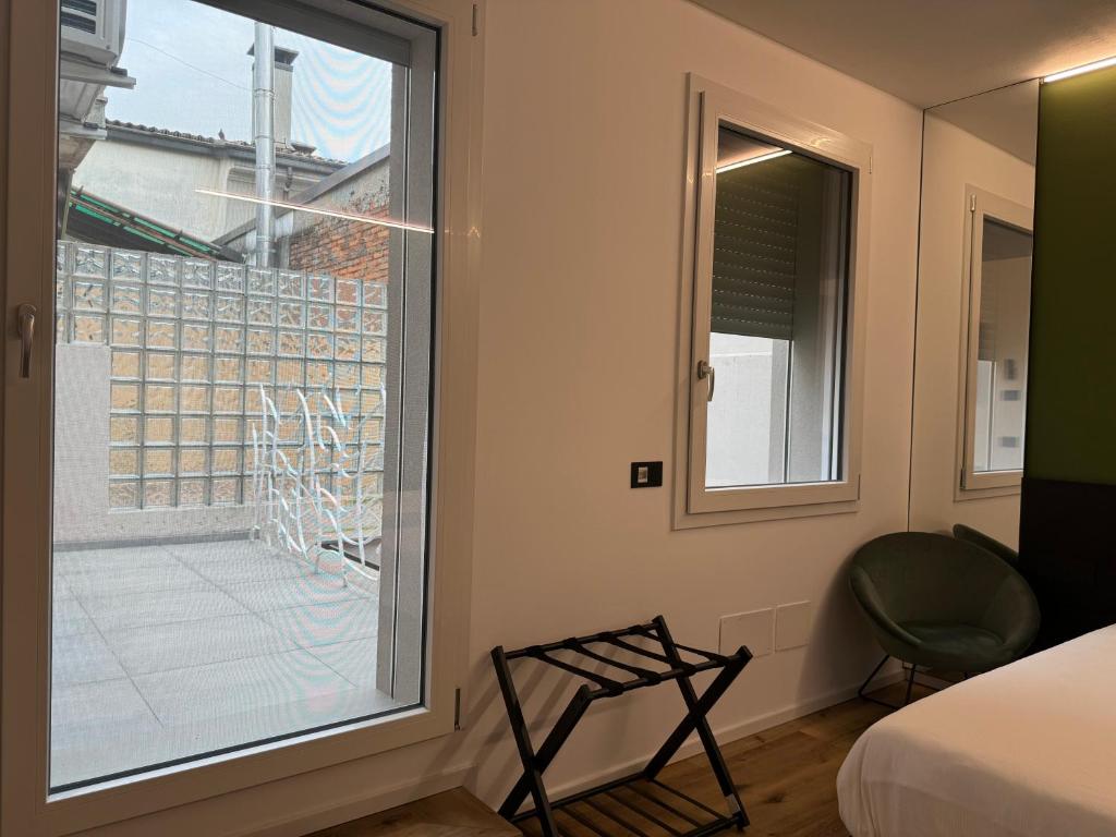 Postel nebo postele na pokoji v ubytování AdisArtur Elegant B&B