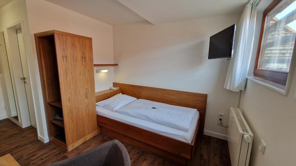 Postel nebo postele na pokoji v ubytování Kloster Drübeck
