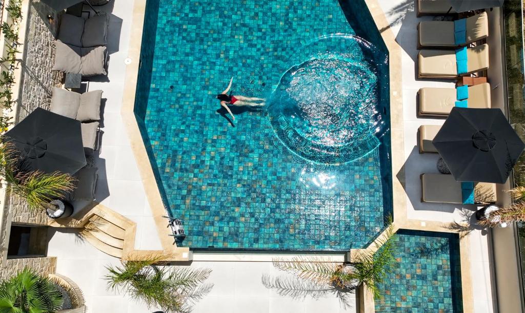 Bazén v ubytování La Stella Suites nebo v jeho okolí