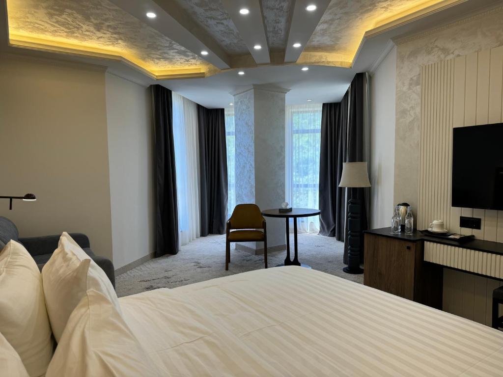 Кровать или кровати в номере Eighty Eight Deluxe Hotel & Spa