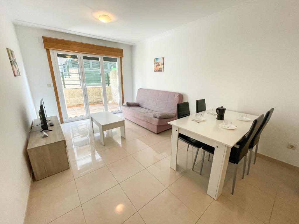 Posedenie v ubytovaní Apartamentos Playa de la Lanzada 3000