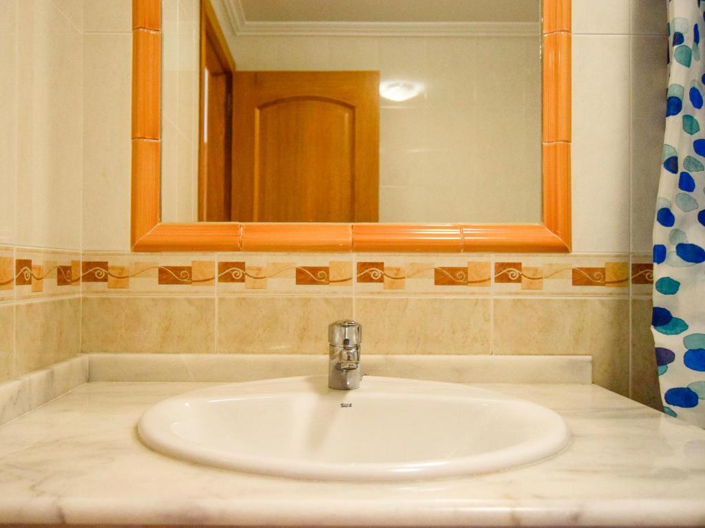 Kúpeľňa v ubytovaní Apartamentos Playa de la Lanzada 3000