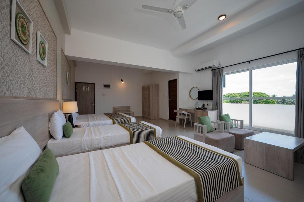 Hotel Oviya - Family Suite With Balcony