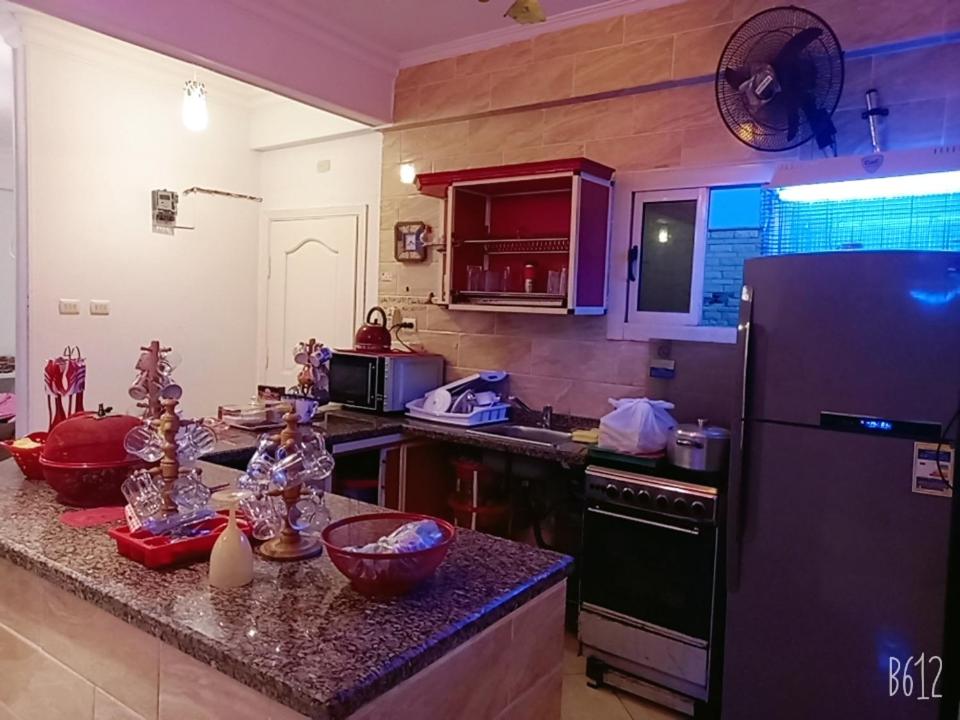 Kuchyň nebo kuchyňský kout v ubytování شاليه في قرية اللوتس الساحل الشمالي