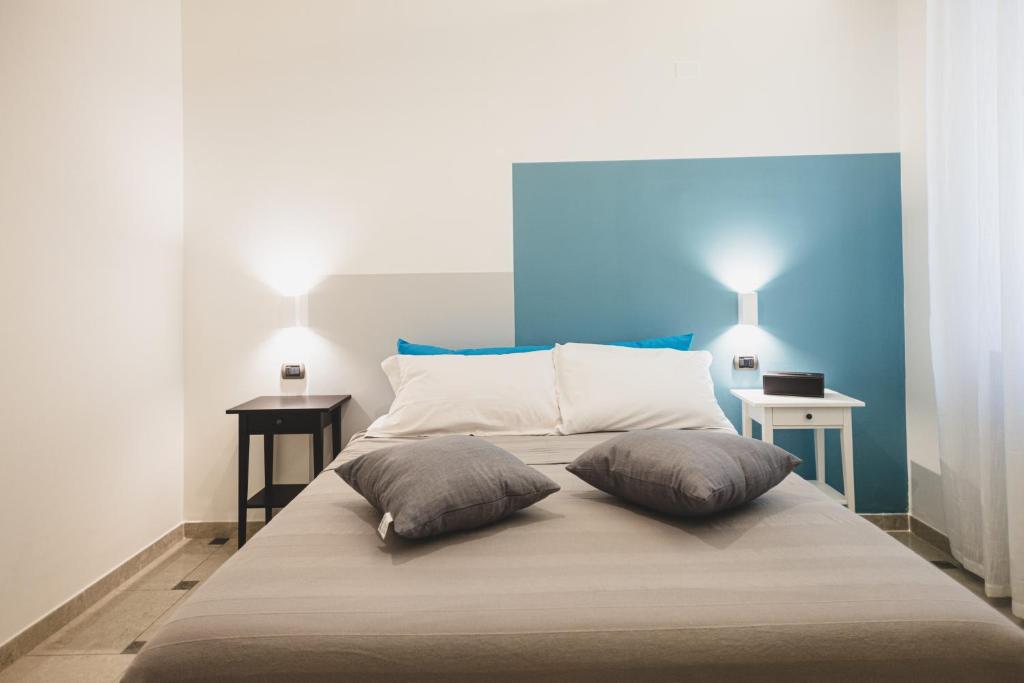Postel nebo postele na pokoji v ubytování Piazza Verdi B&B