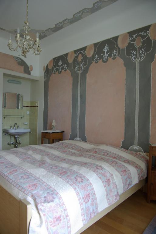 Postel nebo postele na pokoji v ubytování Bed and Breakfast Casa Locarno