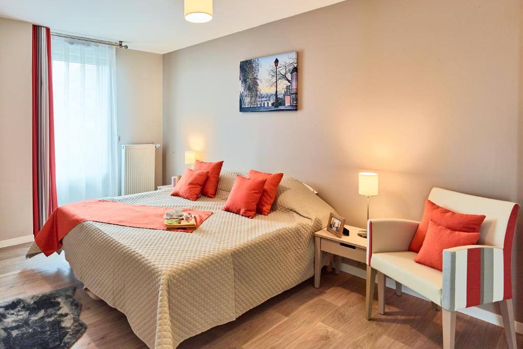 Posteľ alebo postele v izbe v ubytovaní Zenao Appart'hôtels Suresnes