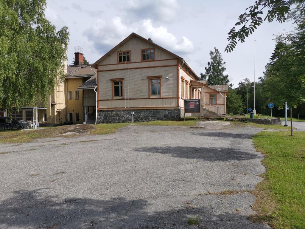 a house sitting on the side of a road at Linnantie 2 in Mikkeli