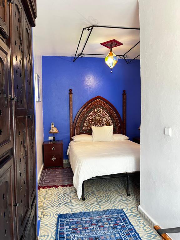 Postel nebo postele na pokoji v ubytování Riad Tassili Chaouen