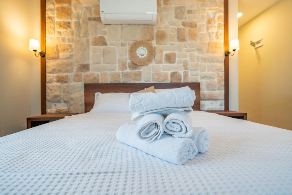 Postel nebo postele na pokoji v ubytování Selimiye Thales Otel