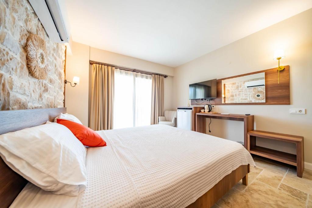 Postel nebo postele na pokoji v ubytování Selimiye Thales Otel