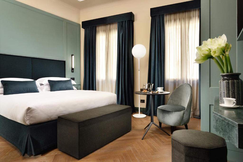 Postel nebo postele na pokoji v ubytování Floren Hotel
