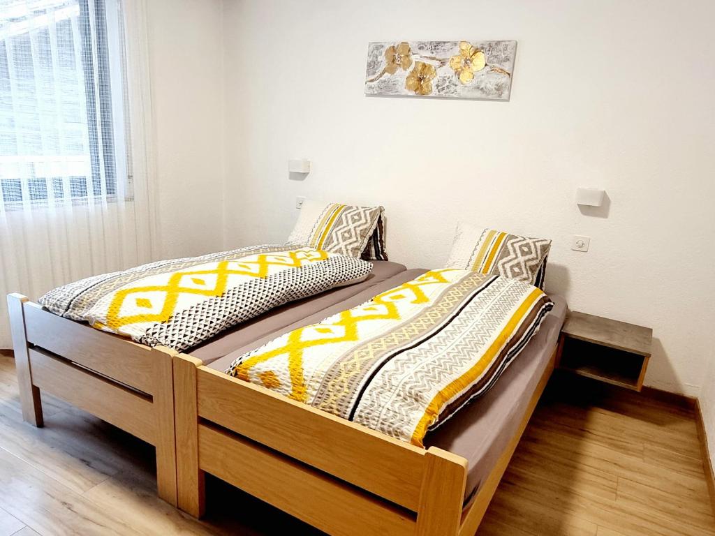 Postel nebo postele na pokoji v ubytování Ferienhaus Adonis