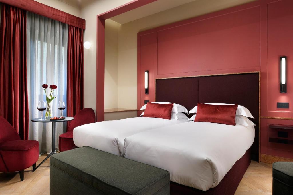 Postel nebo postele na pokoji v ubytování Floren Hotel