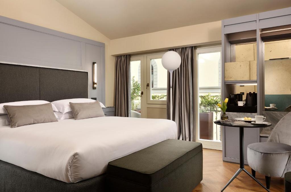 Postel nebo postele na pokoji v ubytování Floren Hotel