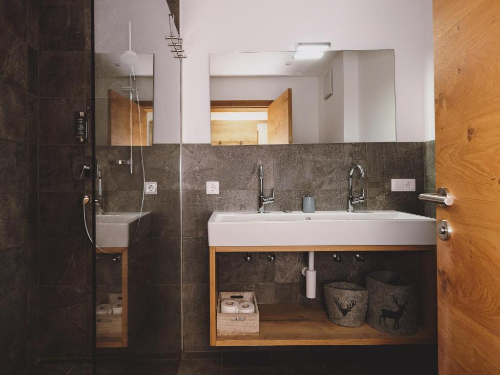 Kúpeľňa v ubytovaní First IN Mountain Chalets by we rent