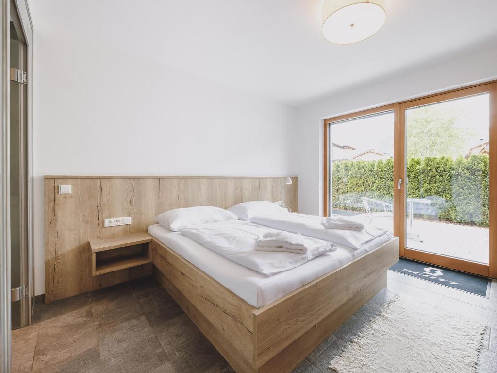 Posteľ alebo postele v izbe v ubytovaní First IN Mountain Chalets by we rent