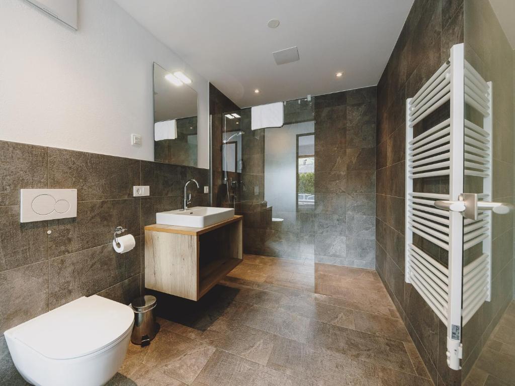 Kúpeľňa v ubytovaní First IN Mountain Chalets by we rent