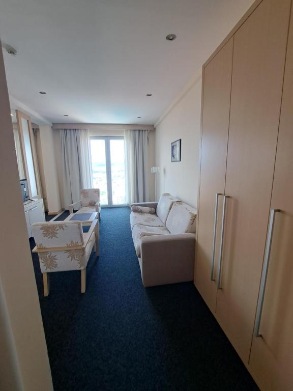 Postel nebo postele na pokoji v ubytování Hotel Marica