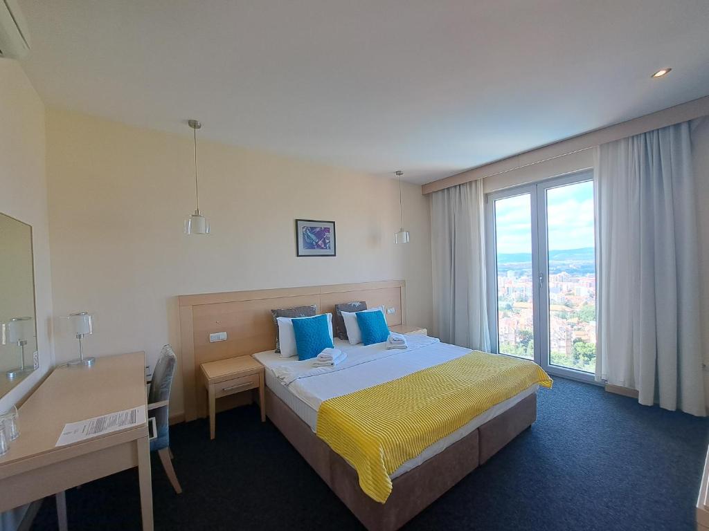 Postel nebo postele na pokoji v ubytování Hotel Marica