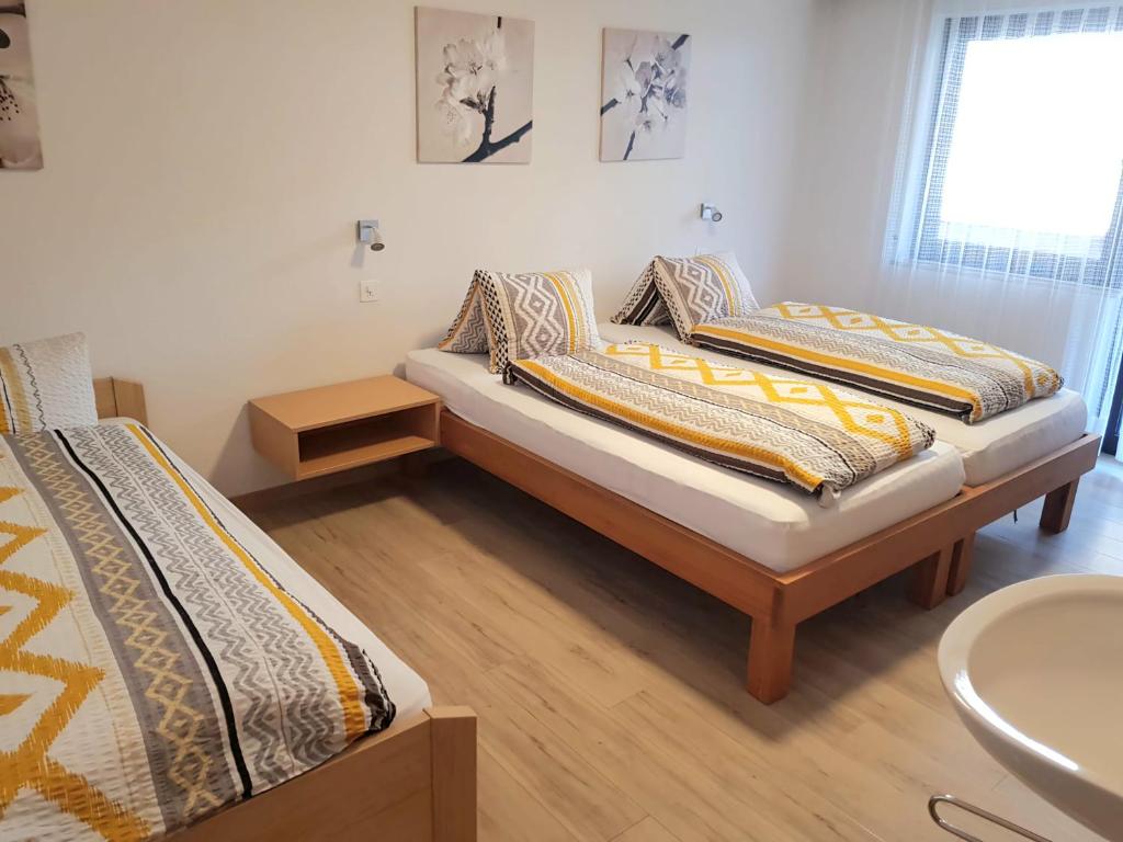 Postel nebo postele na pokoji v ubytování Ferienhaus Adonis