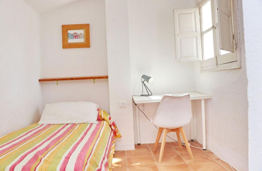 Postel nebo postele na pokoji v ubytování La Casa Andaluza