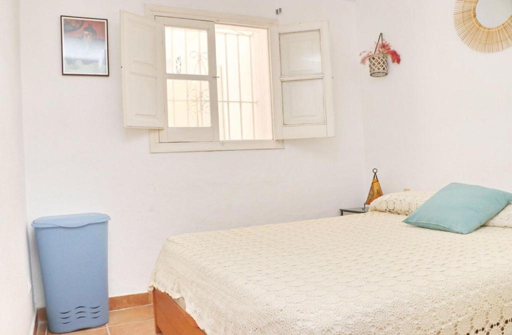 Postel nebo postele na pokoji v ubytování La Casa Andaluza