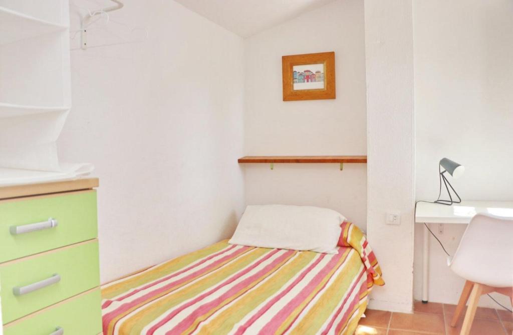 Postel nebo postele na pokoji v ubytování La Casa Andaluza