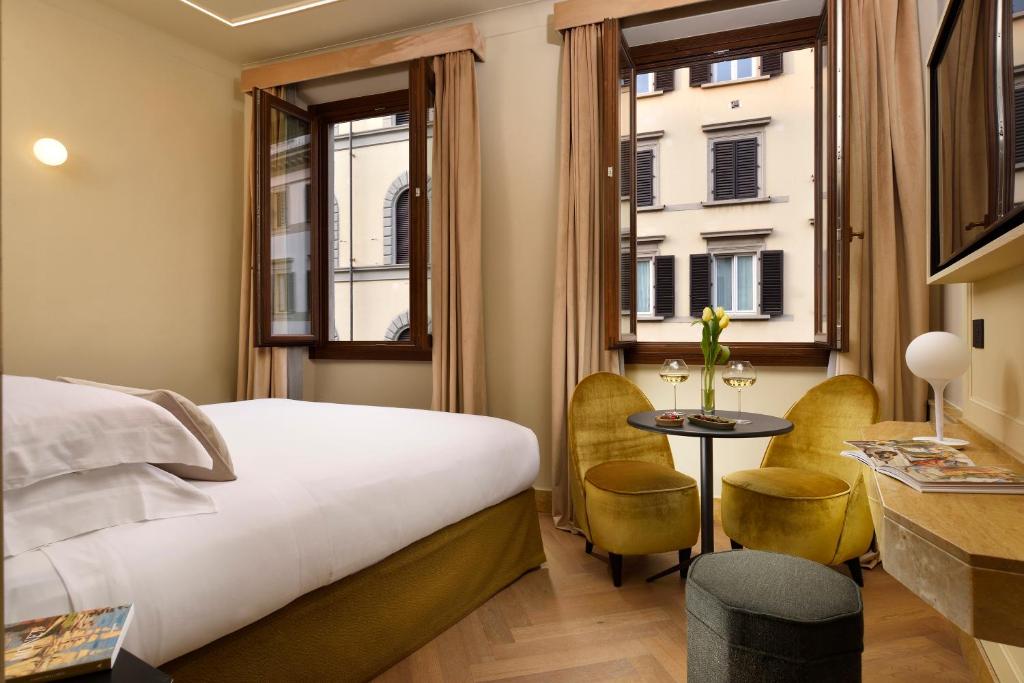 Postel nebo postele na pokoji v ubytování Floren Hotel