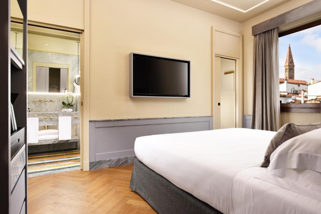 TV a/nebo společenská místnost v ubytování Floren Hotel