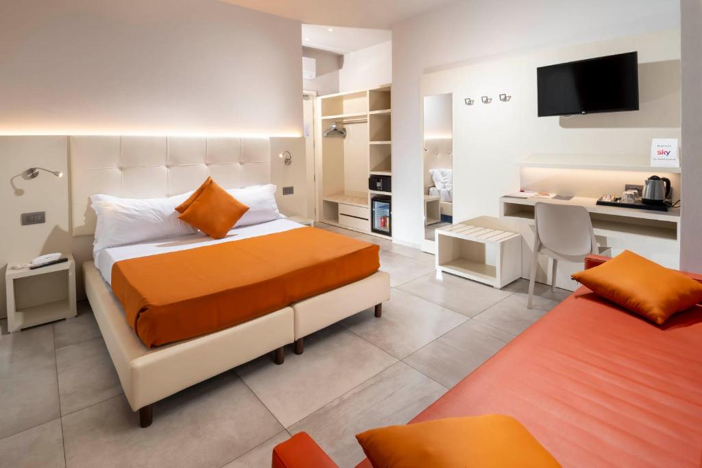 Postel nebo postele na pokoji v ubytování B&B Primrose Residence Hotel