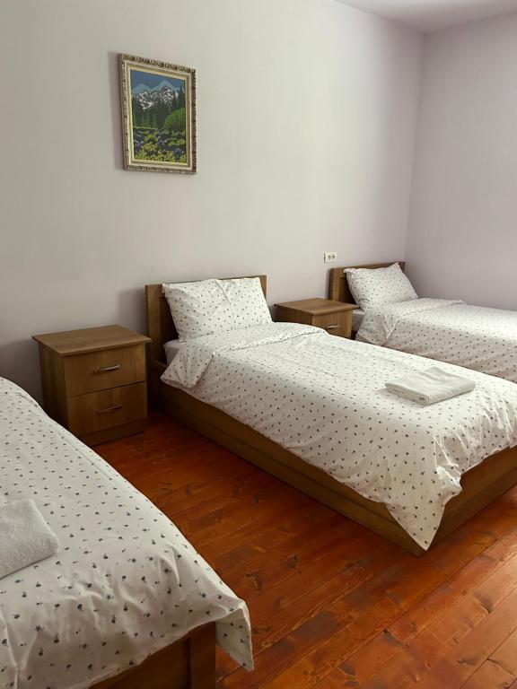 Postel nebo postele na pokoji v ubytování VITA Guesthouse