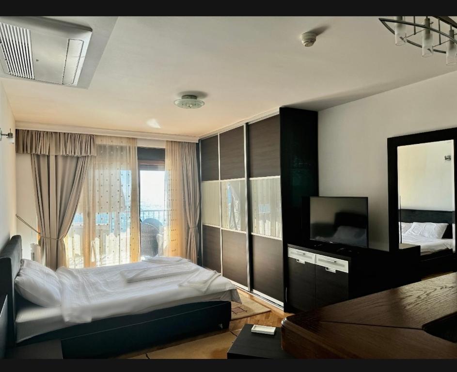 Postel nebo postele na pokoji v ubytování Apartments Lungo Mare