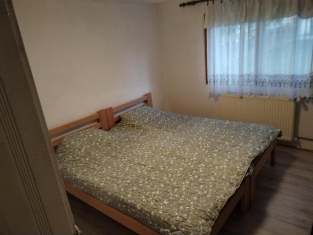 Postel nebo postele na pokoji v ubytování Smeštaj Aleksa