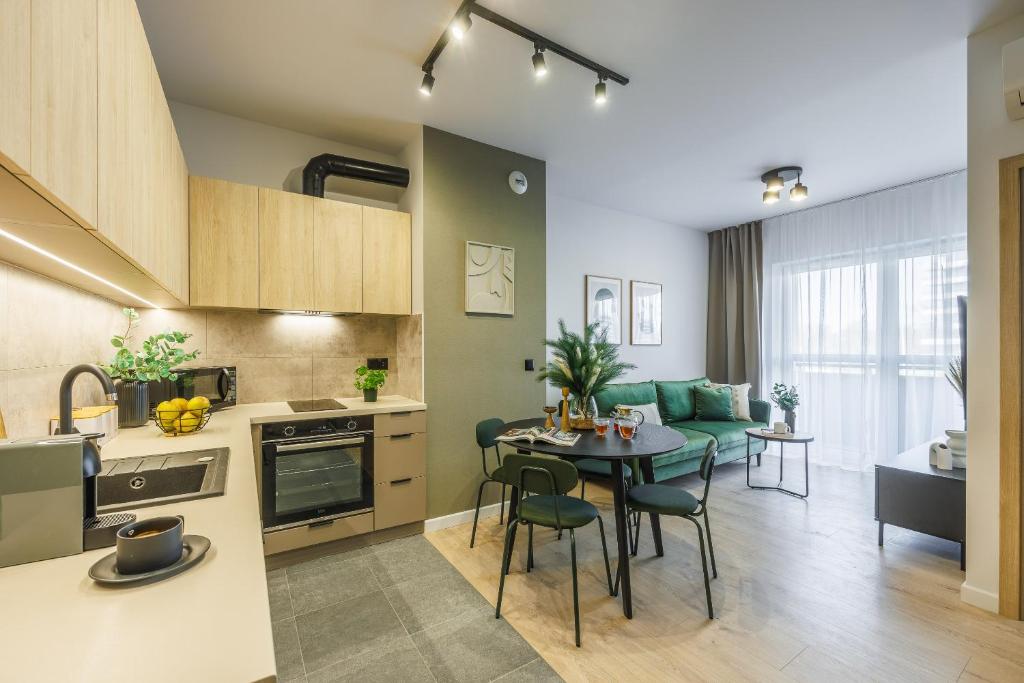 Kuchyň nebo kuchyňský kout v ubytování Emihouse Riverside Apartments