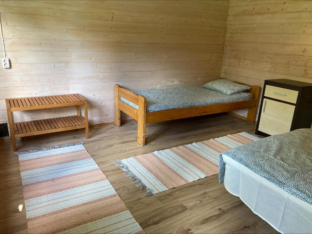 Postel nebo postele na pokoji v ubytování Kuriste camping