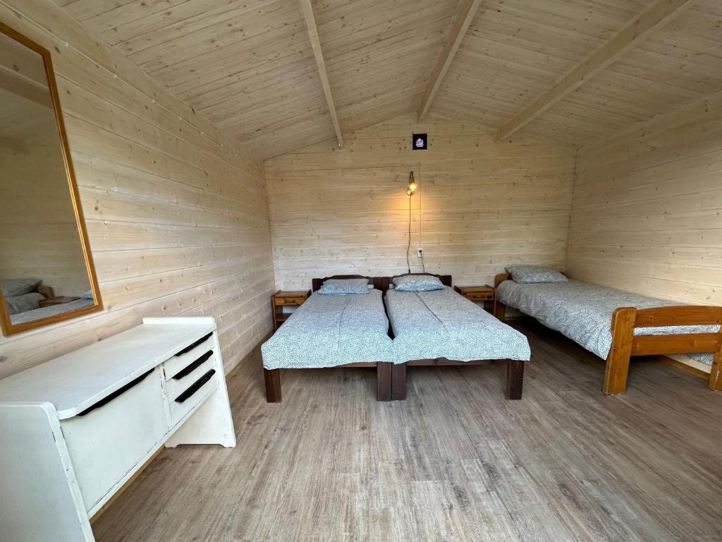 Postel nebo postele na pokoji v ubytování Kuriste camping