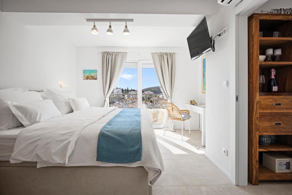 Ένα ή περισσότερα κρεβάτια σε δωμάτιο στο Stunning seaview retreat with terrace