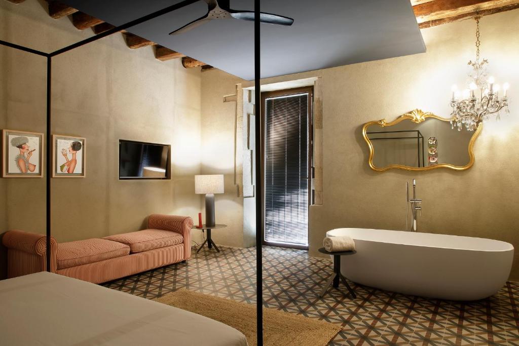 Postel nebo postele na pokoji v ubytování Amore Mio Suite - Ortigia Holidays