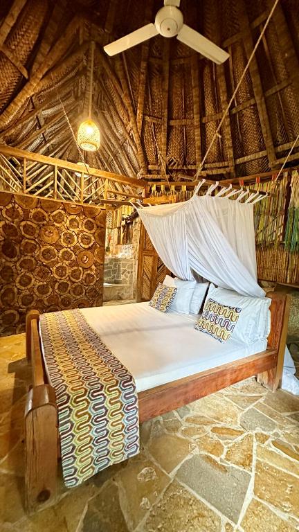 Letto o letti in una camera di Eco Hostal Yuluka