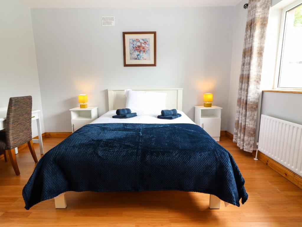 Postel nebo postele na pokoji v ubytování Fort Lodge